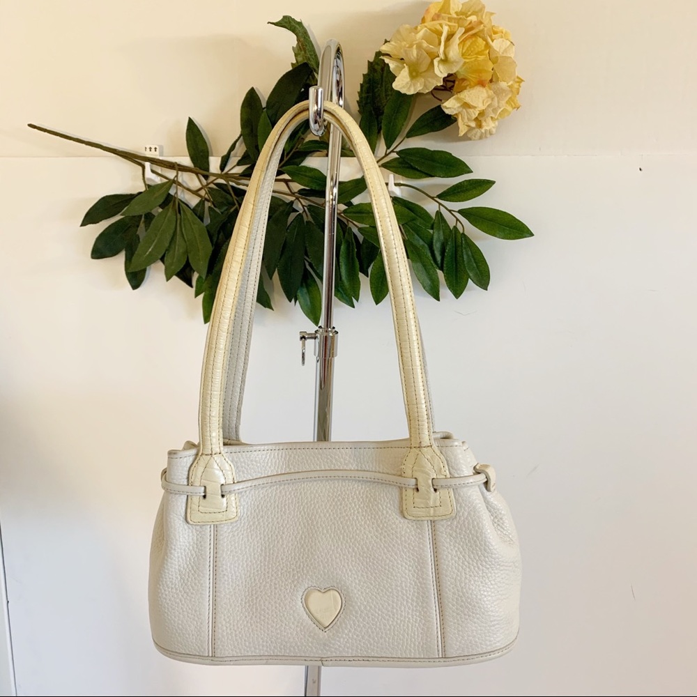 - Vintage Brighton with yellow heart and handle